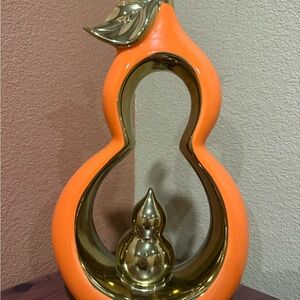 Orange and Gold Decorative Sculpture